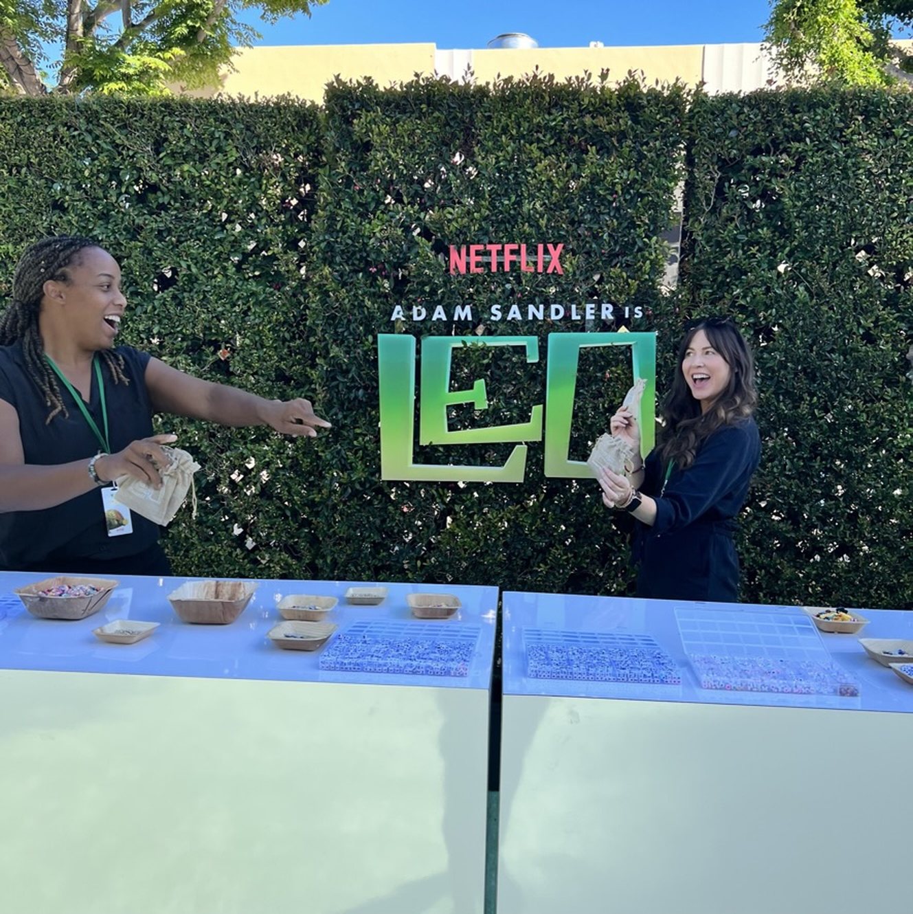 Making station in front of the Netflix Leo premiere backdrop at the Bruin Theatre